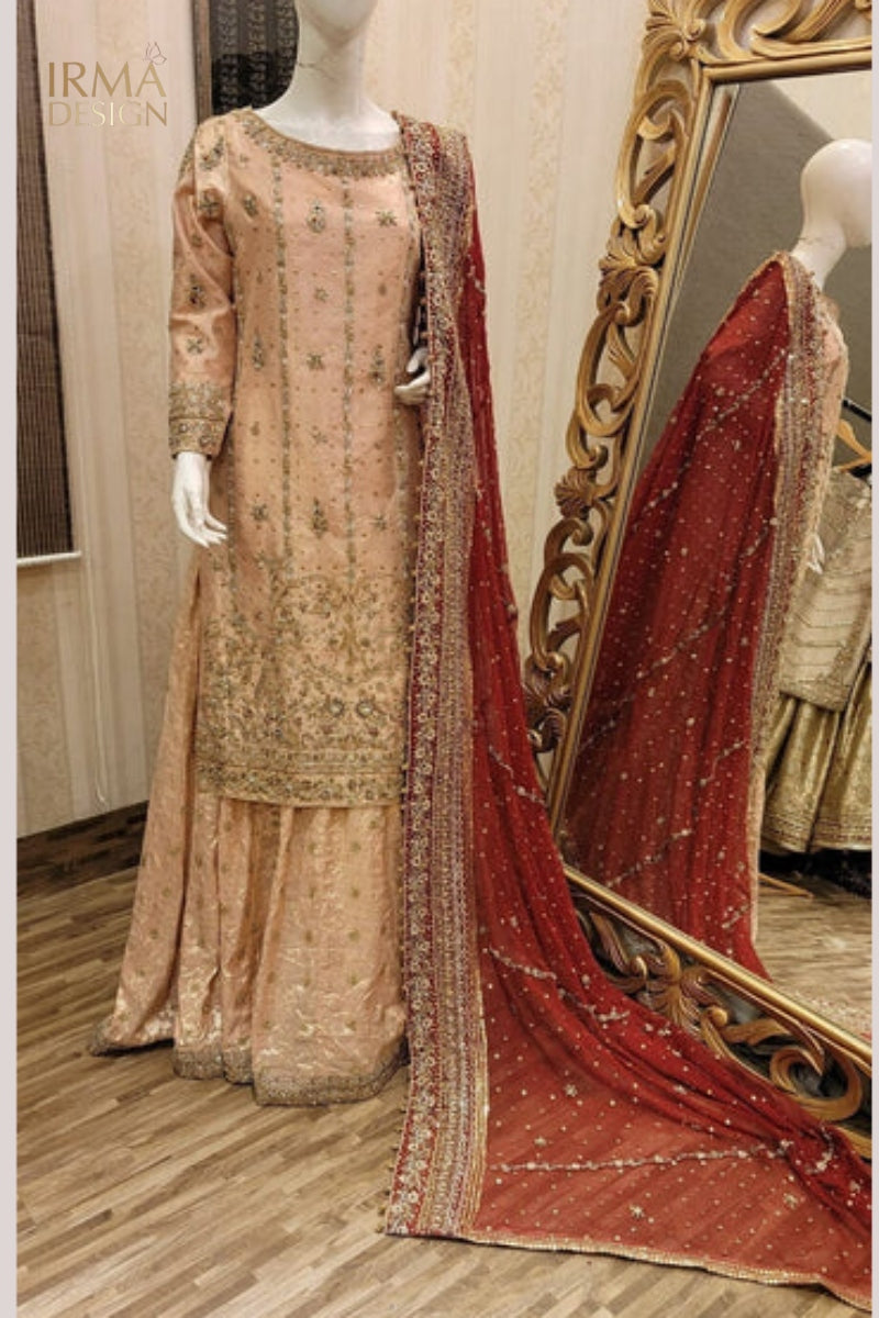 Pakistani blush and red bridal dress