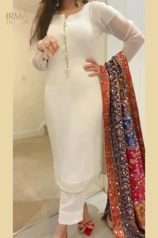 White shalwar kameez with colorful shawl